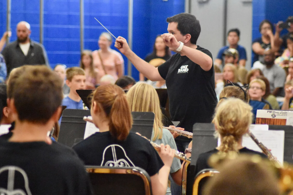 Director Mr. Steve Thomas directs students during summer band camp